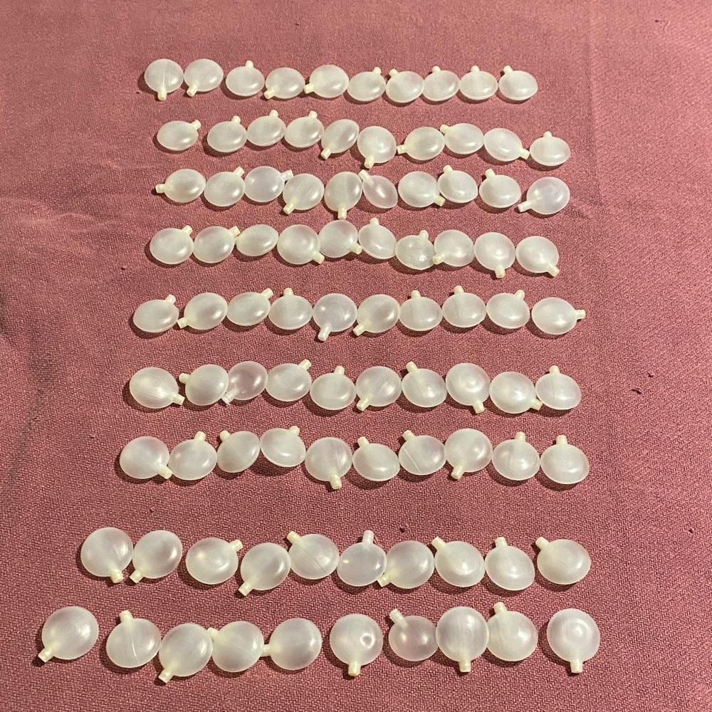 90 medium sized dog toy replacement squeakers.